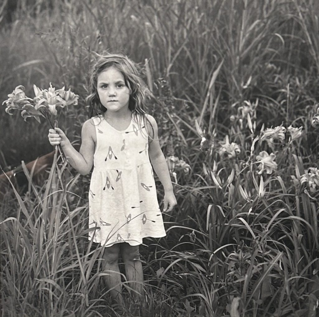 image of girl in the grass