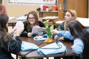 Middle school students working on a science project