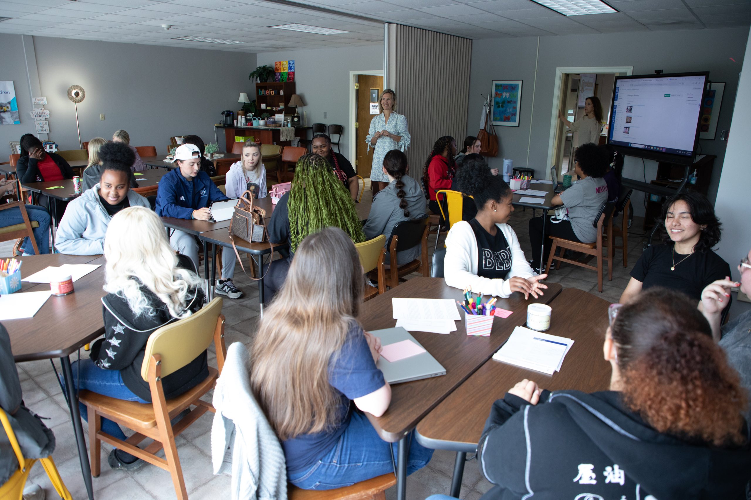 Education students collaborating in class