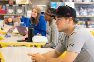Education students in one of their education courses listening to a guest speaker