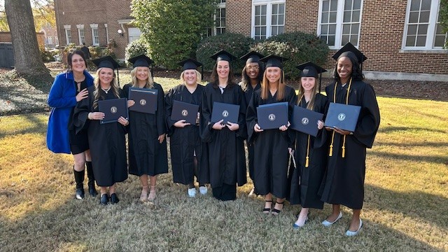 Education graduates with their diplomas