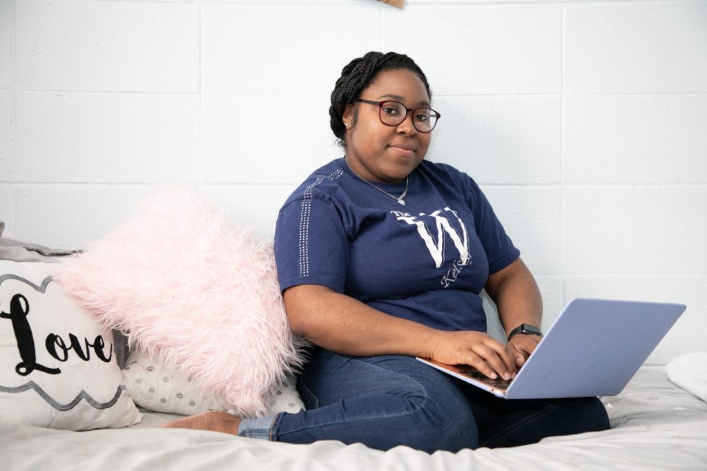 Woman studying in residence hall