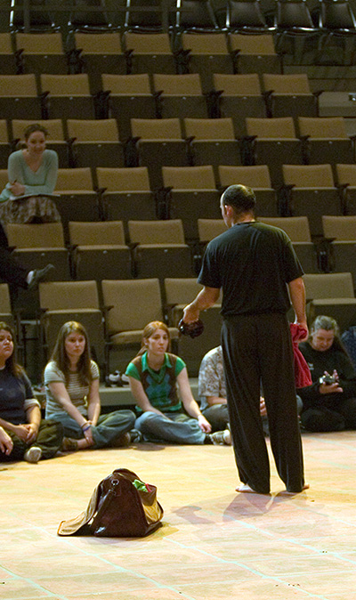 Theatre instructor with students