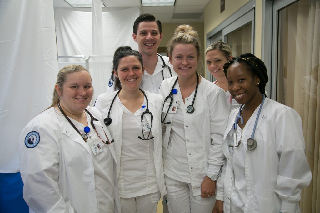 Six nursing students in a simulation lab