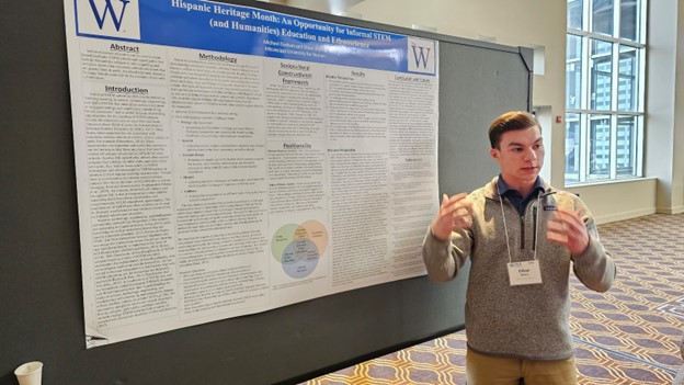 Ethan Wilkins presenting his poster.