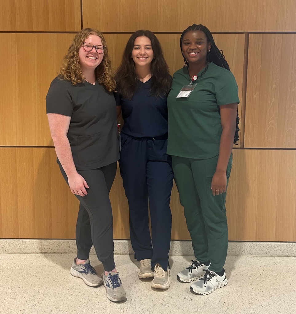 Mallory Parker Williams, Maggie Smith, and Laila Wrenn standing together.