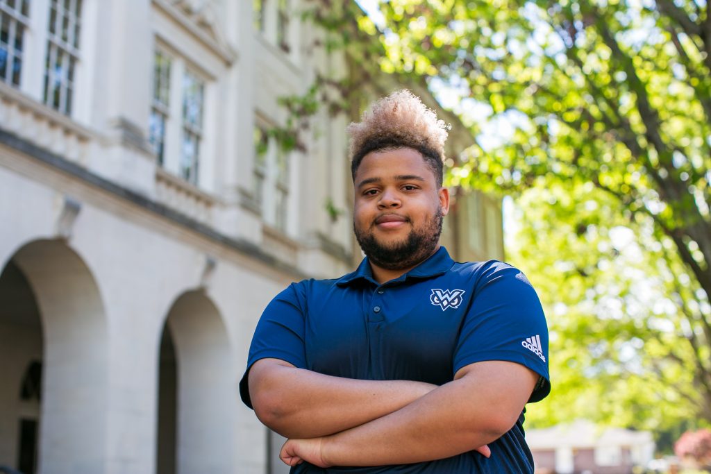 student in owls shirt
