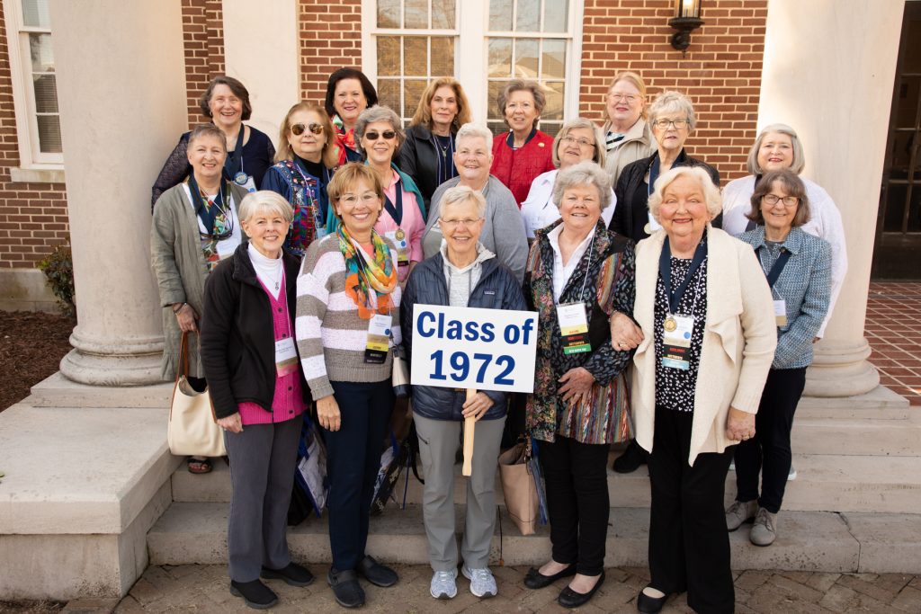 The alumnae class of 1972 stands on the front steps of Whitfield Hall
