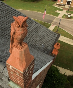 A terracotta owl atop Orr Hall