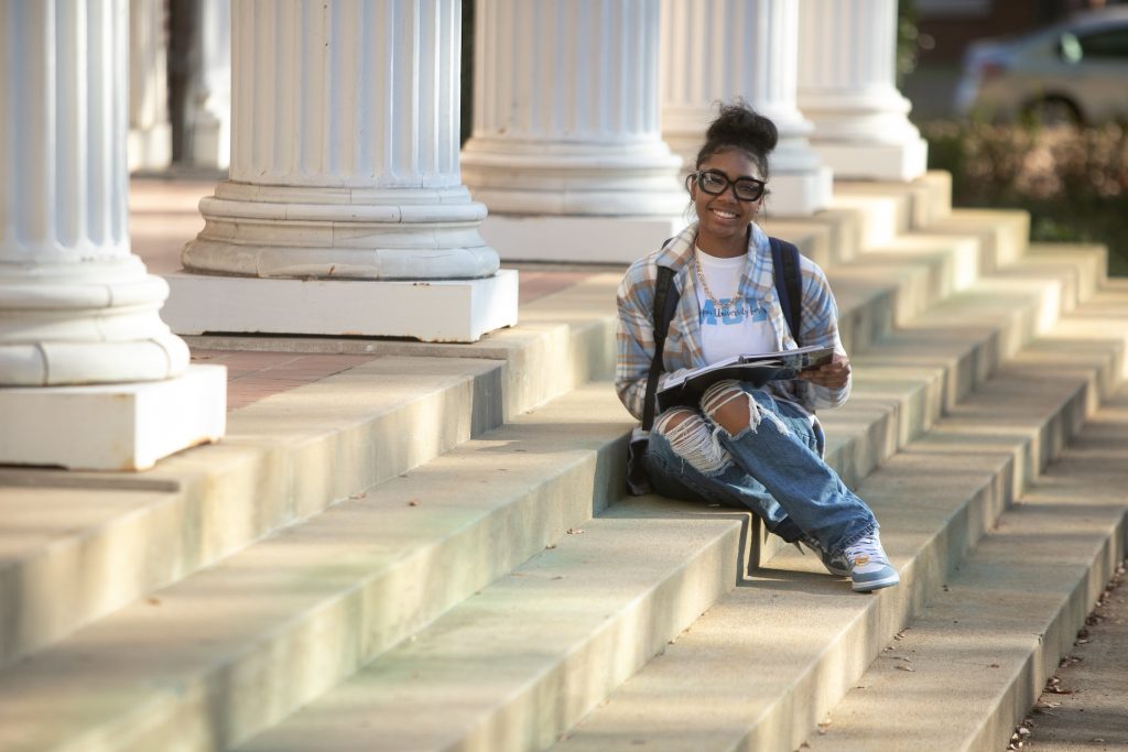 Female student on steps