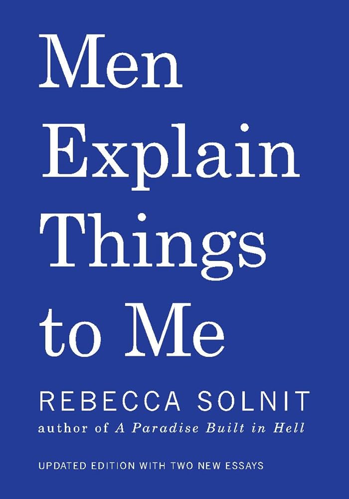 Book cover of Men Explain Things to Me by Rebecca Solnit. White text on royal blue background.