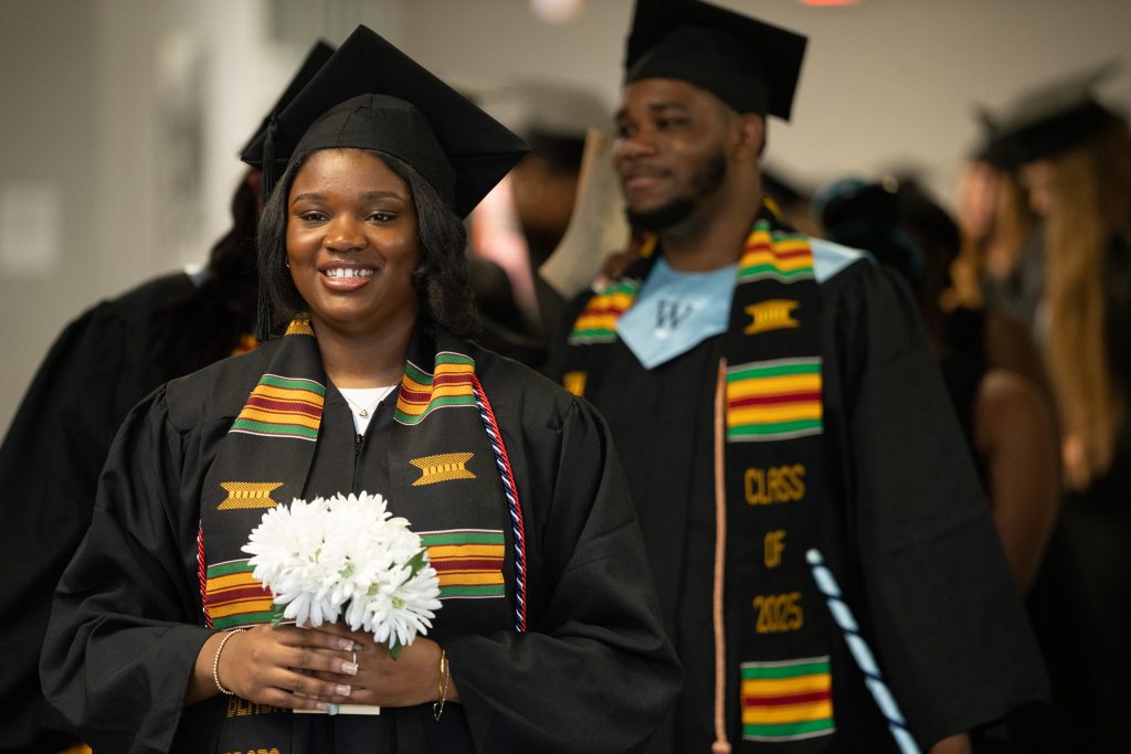 Students wearing graduation regalia
